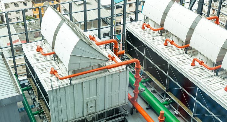 Sets of cooling towers in data center building