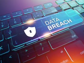 Tastatur, über der ein transparentes Banner mit der Aufschrift Data Breach und einem Symbol für Datensicherheit schwebt